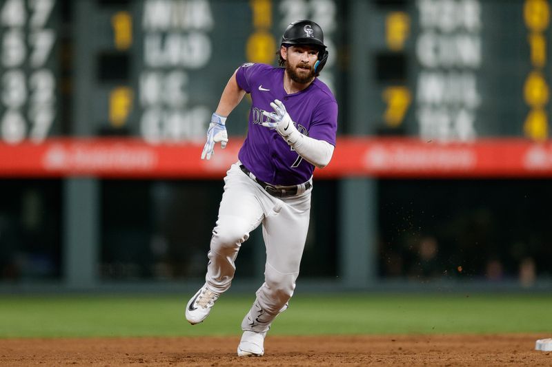 Aug 18, 2023; Denver, Colorado, USA; Colorado Rockies second baseman Brendan Rodgers (7) runs to third on a two RBI triple in the sixth inning against the Chicago White Sox at Coors Field. Mandatory Credit: Isaiah J. Downing-USA TODAY Sports