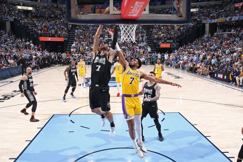 MEMPHIS, TN - APRIL 19: Santi Aldama #7 of the Memphis Grizzlies drives to the basket during Round One Game Two of the 2023 NBA Playoffs against the Los Angeles Lakers on April 19, 2023 at FedExForum in Memphis, Tennessee. NOTE TO USER: User expressly acknowledges and agrees that, by downloading and or using this photograph, User is consenting to the terms and conditions of the Getty Images License Agreement. Mandatory Copyright Notice: Copyright 2023 NBAE (Photo by Joe Murphy/NBAE via Getty Images)