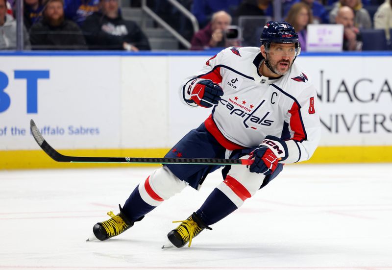 Nov 1, 2025; Buffalo, New York, USA;  Washington Capitals left wing Alex Ovechkin (8) looks for the puck during the first period against the Buffalo Sabres at KeyBank Center. Mandatory Credit: Timothy T. Ludwig-Imagn Images