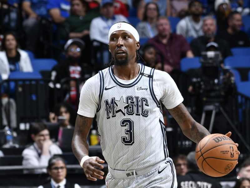 ORLANDO, FL - NOVEMBER 27: Kentavious Caldwell-Pope #3 of the Orlando Magic handles the ball during the game against the Chicago Bulls on November 27, 2024 at Kia Center in Orlando, Florida. NOTE TO USER: User expressly acknowledges and agrees that, by downloading and or using this photograph, User is consenting to the terms and conditions of the Getty Images License Agreement. Mandatory Copyright Notice: Copyright 2024 NBAE (Photo by Fernando Medina/NBAE via Getty Images)