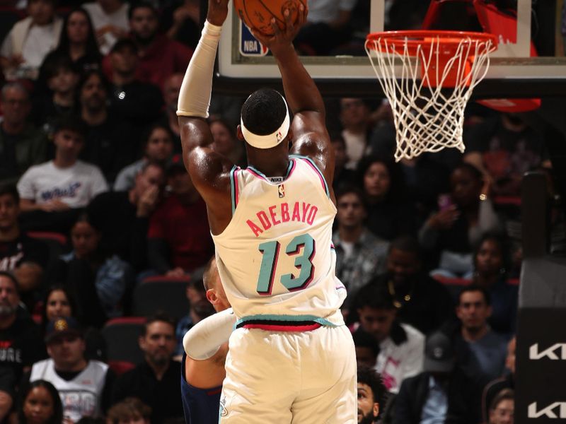 MIAMI, FL - JANUARY 17: Bam Adebayo #13 of the Miami Heat shoots the ball during the game against the Denver Nuggets on January 17, 2025 at Kaseya Center in Miami, Florida. NOTE TO USER: User expressly acknowledges and agrees that, by downloading and or using this Photograph, user is consenting to the terms and conditions of the Getty Images License Agreement. Mandatory Copyright Notice: Copyright 2025 NBAE (Photo by Issac Baldizon/NBAE via Getty Images)