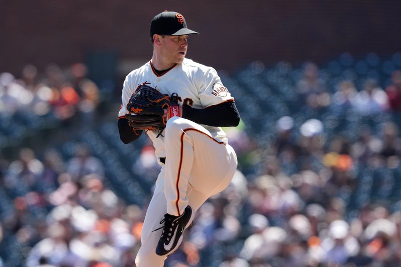 Apr 9, 2023; San Francisco, California, USA; San Francisco Giants starting pitcher Anthony DeSclafani (26) throws a pitch against the Kansas City Royals during the first inning at Oracle Park. Mandatory Credit: Darren Yamashita-USA TODAY Sports