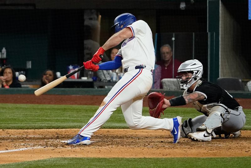 Jul 22, 2024; Arlington, Texas, USA; Texas Rangers left fielder Wyatt Langford (36) hits a walk-off RBI single during the tenth inning against the Chicago White Sox at Globe Life Field. Mandatory Credit: Raymond Carlin III-USA TODAY Sports