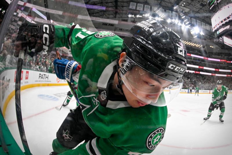 Mar 6, 2026; Dallas, Texas, USA; Dallas Stars left wing Jason Robertson (21) is checked into the boards by Colorado Avalanche left wing Gabriel Landeskog (92) during the second period at the American Airlines Center. Mandatory Credit: Jerome Miron-Imagn Images