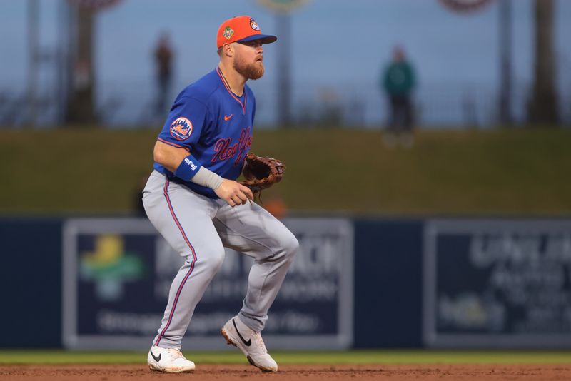 Mar 13, 2026; West Palm Beach, Florida, USA; New York Mets third baseman Christian Arroyo (28) defends his position against the Washington Nationals during the second inning at CACTI Park of the Palm Beaches. Mandatory Credit: Sam Navarro-Imagn Images