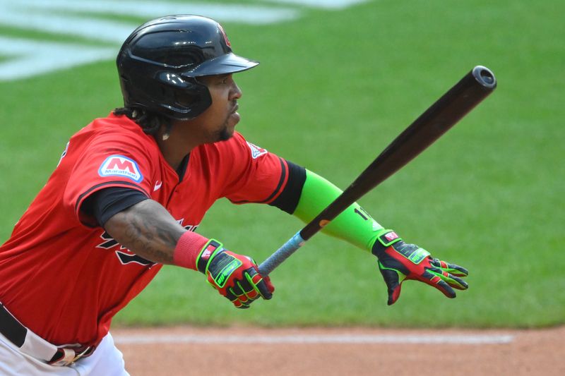 Aug 5, 2024; Cleveland, Ohio, USA; Cleveland Guardians third baseman Jose Ramirez (11) hits an RBI double in the first inning against the Arizona Diamondbacks at Progressive Field. Mandatory Credit: David Richard-USA TODAY Sports