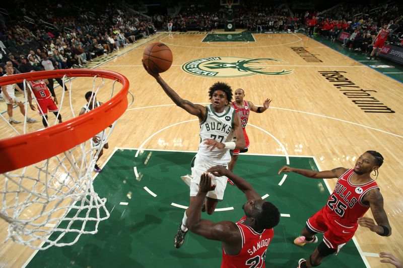 MILWAUKEE, WI - OCTOBER 14: AJ Johnson #77 of the Milwaukee Bucks shoots the ball during the game against the Chicago Bulls on October 14, 2024 at Fiserv Forum Center in Milwaukee, Wisconsin. NOTE TO USER: User expressly acknowledges and agrees that, by downloading and or using this Photograph, user is consenting to the terms and conditions of the Getty Images License Agreement. Mandatory Copyright Notice: Copyright 2024 NBAE (Photo by Gary Dineen/NBAE via Getty Images).