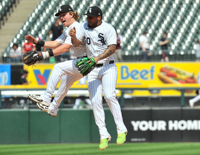 Jun 25, 2025; Chicago, Illinois, USA; Chicago White Sox shortstop Chase Meidroth (10) and second baseman Lenyn Sosa (50) celebrate after defeating the Arizona Diamondbacks at Rate Field. Mandatory Credit: Patrick Gorski-Imagn Images