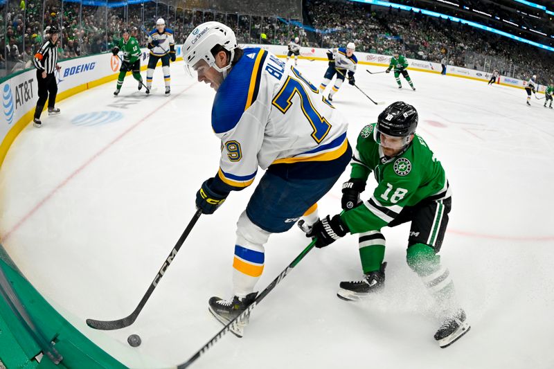 Apr 17, 2024; Dallas, Texas, USA; St. Louis Blues left wing Sammy Blais (79) and Dallas Stars center Sam Steel (18) battle for control of the puck in the Blues zone during the second period at the American Airlines Center. Mandatory Credit: Jerome Miron-USA TODAY Sports