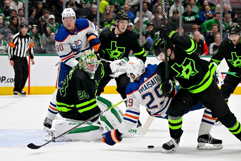 Apr 3, 2024; Dallas, Texas, USA; Dallas Stars goaltender Jake Oettinger (29) and defenseman Nils Lundkvist (5) and center Sam Steel (18) and Edmonton Oilers right wing Corey Perry (90) and center Leon Draisaitl (29) look for the puck in the Stars zone during the first period at the American Airlines Center. Mandatory Credit: Jerome Miron-USA TODAY Sports