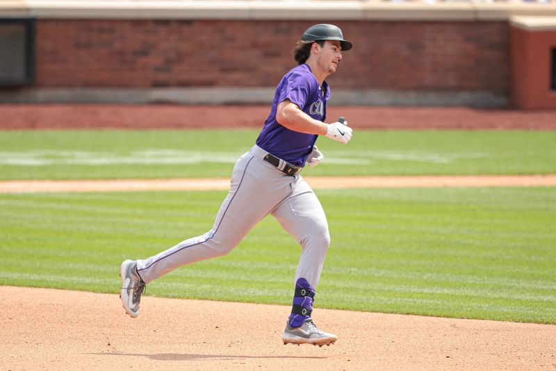 Jul 14, 2024; New York City, New York, USA; Colorado Rockies first baseman Michael Toglia (4) runs the bases during his solo home run during the fifth inning against the New York Mets at Citi Field. Mandatory Credit: Vincent Carchietta-USA TODAY Sports