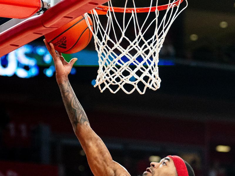 Feb 17, 2024; Lincoln, Nebraska, USA; Nebraska Cornhuskers guard Jamarques Lawrence (10) shoots the ball against the Penn State Nittany Lions during the first half at Pinnacle Bank Arena. Mandatory Credit: Dylan Widger-USA TODAY Sports