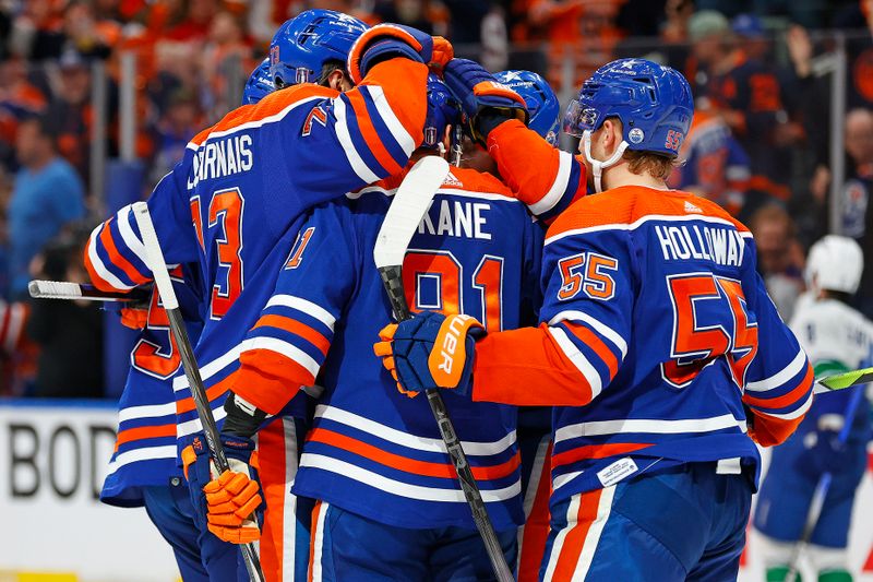 May 18, 2024; Edmonton, Alberta, CAN; The Edmonton Oilers celebrate a goal scored by forward Evander Kane (91) during the third period against the Vancouver Canucks in game six of the second round of the 2024 Stanley Cup Playoffs at Rogers Place. Mandatory Credit: Perry Nelson-USA TODAY Sports