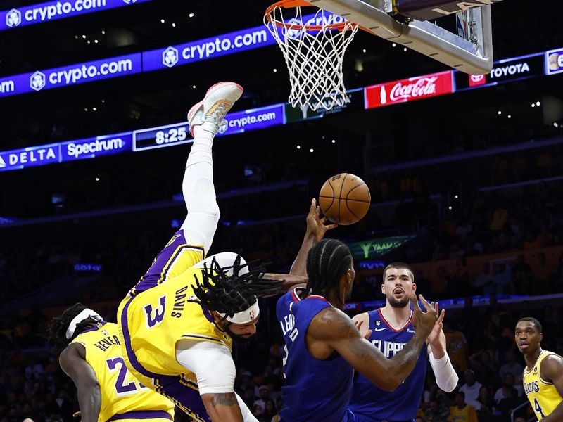 LOS ANGELES, CALIFORNIA - OCTOBER 20:  Anthony Davis #3 of the Los Angeles Lakers fouls Kawhi Leonard #2 of the LA Clippers in the third quarter at Crypto.com Arena on October 20, 2022 in Los Angeles, California.  NOTE TO USER: User expressly acknowledges and agrees that, by downloading and/or using this photograph, user is consenting to the terms and conditions of the Getty Images License Agreement.  (Photo by Ronald Martinez/Getty Images)