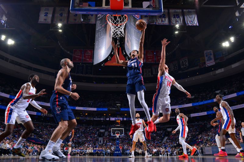 PHILADELPHIA, PA - APRIL 9: Jeff Dowtin Jr. #11 of the Philadelphia 76ers drives to the basket during the game against the Detroit Pistons on April 9, 2024 at the Wells Fargo Center in Philadelphia, Pennsylvania NOTE TO USER: User expressly acknowledges and agrees that, by downloading and/or using this Photograph, user is consenting to the terms and conditions of the Getty Images License Agreement. Mandatory Copyright Notice: Copyright 2024 NBAE (Photo by Jesse D. Garrabrant/NBAE via Getty Images)