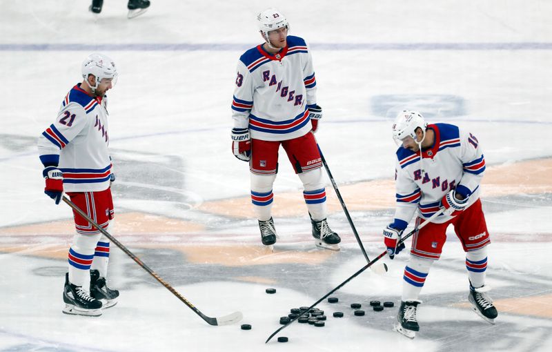 Mar 16, 2024; Pittsburgh, Pennsylvania, USA; New York Rangers center Barclay Goodrow (21) and defenseman Adam Fox (23) and center Vincent Trocheck (16) warm up before the game against the Pittsburgh Penguins at PPG Paints Arena. Mandatory Credit: Charles LeClaire-USA TODAY Sports