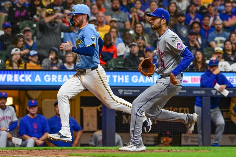 Sep 27, 2024; Milwaukee, Wisconsin, USA;  Milwaukee Brewers second baseman Brice Turang (2) scores after a wild pitch by New York Mets pitcher Danny Young (81) in the sixth inning at American Family Field. Mandatory Credit: Benny Sieu-Imagn Images