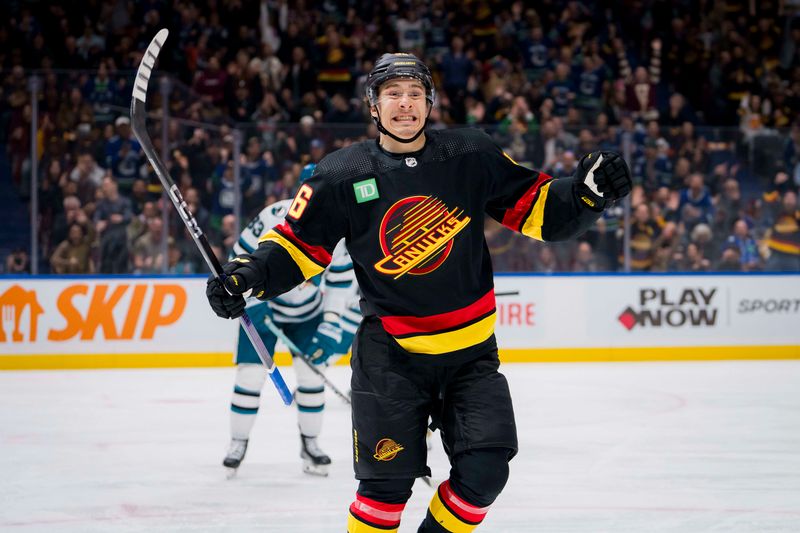 Dec 23, 2023; Vancouver, British Columbia, CAN; Vancouver Canucks forward Andrei Kuzmenko (96) celebrates his first goal of the game against the San Jose Sharks in the first period at Rogers Arena. Mandatory Credit: Bob Frid-USA TODAY Sports