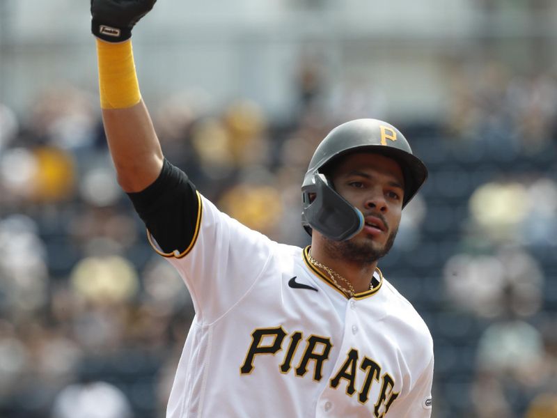 May 10, 2023; Pittsburgh, Pennsylvania, USA;  Pittsburgh Pirates second baseman Tucupita Marcano (30) celebrates while rounding the bases on a solo home run against the Colorado Rockies during the second inning at PNC Park. Mandatory Credit: Charles LeClaire-USA TODAY Sports