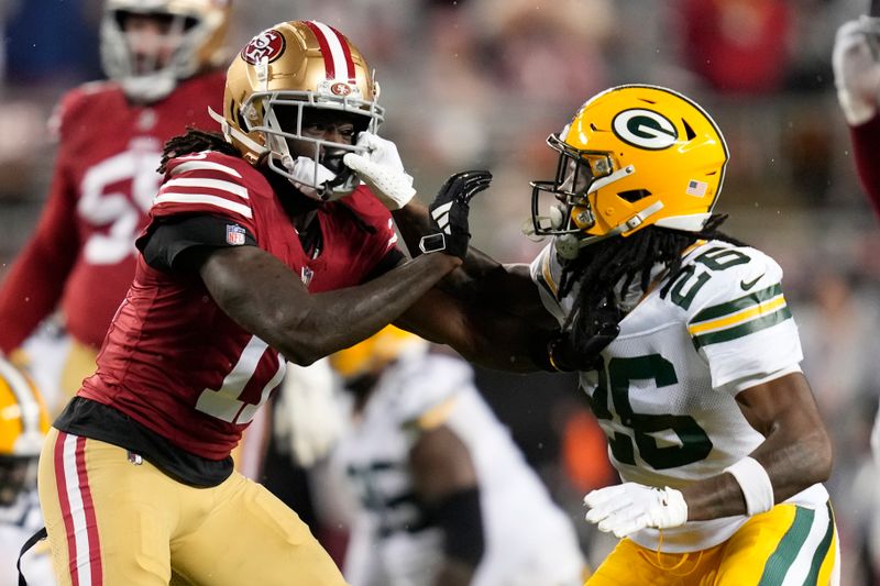 Green Bay Packers safety Darnell Savage (26) defends against San Francisco 49ers wide receiver Brandon Aiyuk (11) during an NFL football game Sunday, Jan. 21, 2024, in Inglewood, Calif. (AP Photo/Ashley Landis)