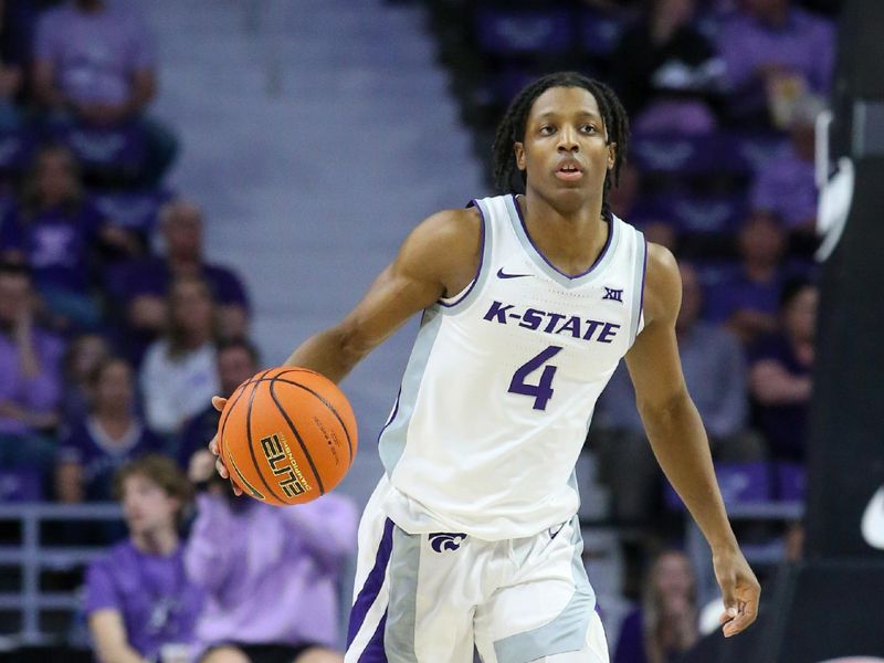 Feb 26, 2024; Manhattan, Kansas, USA; Kansas State Wildcats guard Dai Dai Ames (4) brings the ball up court during the first half against the West Virginia Mountaineers at Bramlage Coliseum. Mandatory Credit: Scott Sewell-USA TODAY Sports