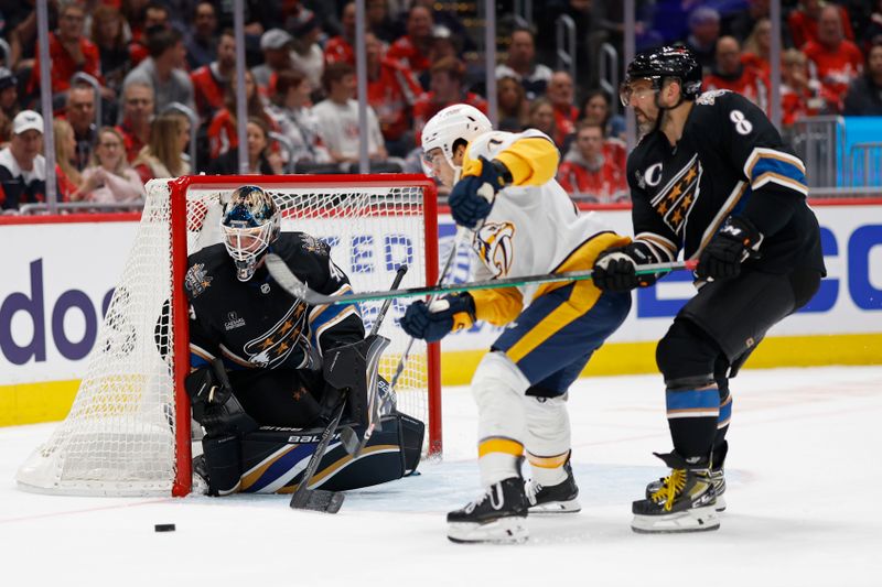 Nov 6, 2024; Washington, District of Columbia, USA; Washington Capitals goaltender Logan Thompson (48) makes a save on Nashville Predators right wing Luke Evangelista (77) as Capitals left wing Alex Ovechkin (8) defends in the second period at Capital One Arena. Mandatory Credit: Geoff Burke-Imagn Images