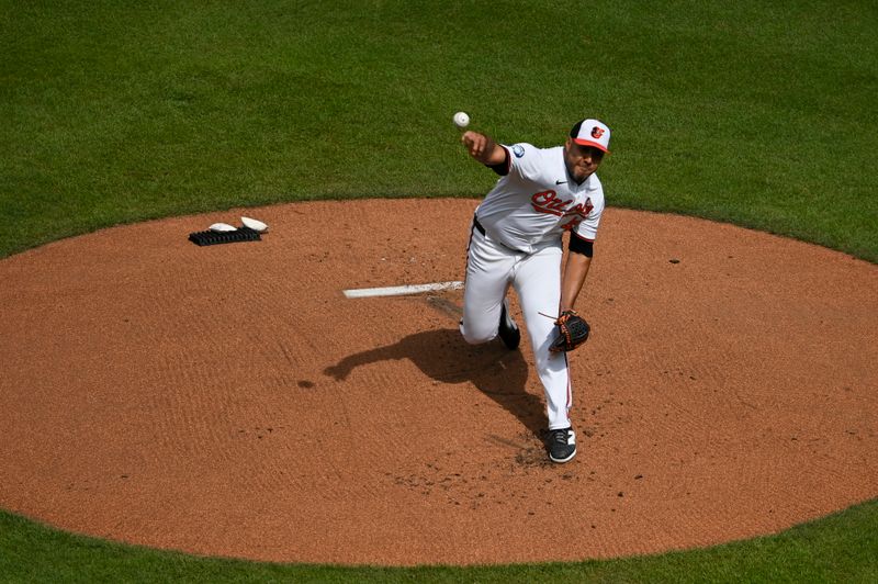 Sep 22, 2024; Baltimore, Maryland, USA; Baltimore Orioles pitcher Albert Suárez (49) throws a first inning pitch Detroit Tigers  at Oriole Park at Camden Yards. Mandatory Credit: Tommy Gilligan-Imagn Images