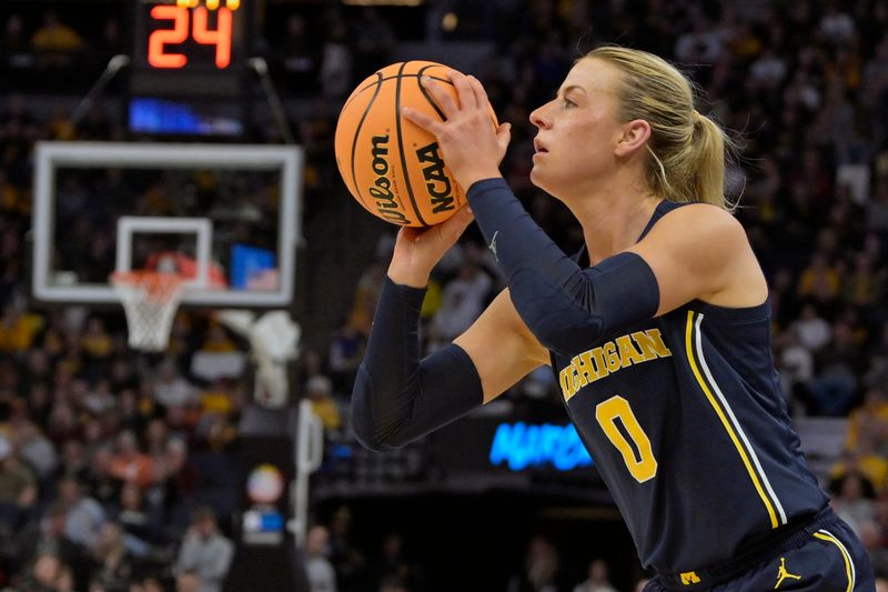 Mar 9, 2024; Minneapolis, MN, USA;  Michigan Wolverines guard Elissa Brett (0) shoots a three-pointer against the Iowa Hawkeyes during the first half of a Big Ten Women's Basketball tournament semifinal at Target Center. Mandatory Credit: Nick Wosika-USA TODAY Sports