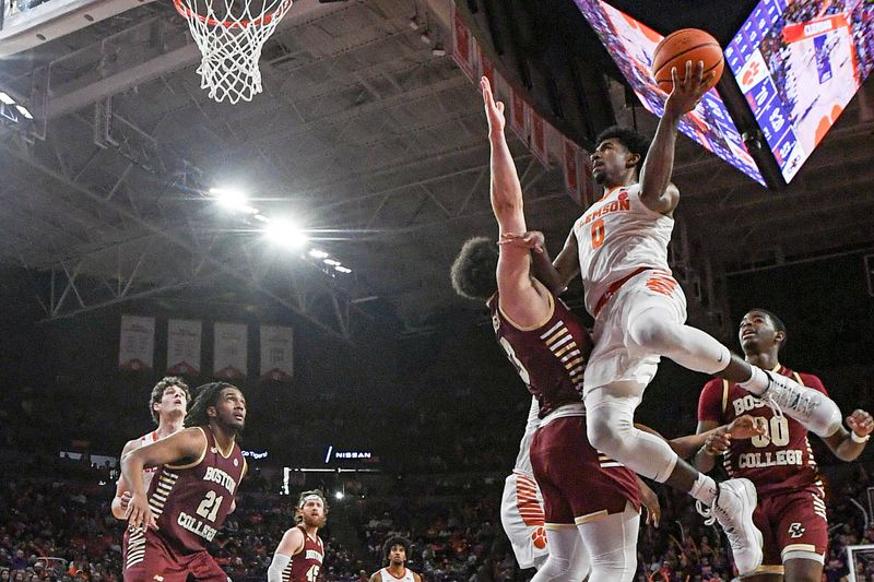 Jan 13, 2024; Clemson, South Carolina, USA; Clemson Tigers  guard Joshua Beadle (0) scores against the Boston College Eagles during the second half at Littlejohn Coliseum. Mandatory Credit: Ken Ruinard-USA TODAY Sports