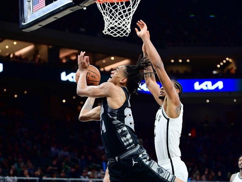 AUSTIN, TX - MARCH 17: Devin Vassell #24 of the San Antonio Spurs drives to the basket during the game against the Brooklyn Nets on March 17, 2024 at the Moody Center in Austin, Texas. NOTE TO USER: User expressly acknowledges and agrees that, by downloading and or using this photograph, user is consenting to the terms and conditions of the Getty Images License Agreement. Mandatory Copyright Notice: Copyright 2024 NBAE (Photos by Michael Gonzales/NBAE via Getty Images)