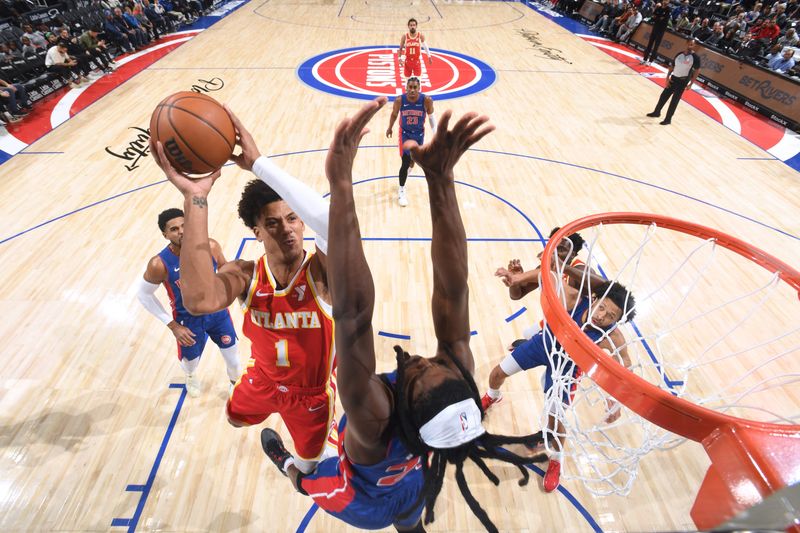 DETROIT, MI - NOVEMBER 8: Jalen Johnson #1 of the Atlanta Hawks shoots the ball during the game against the Detroit Pistons on November  8, 2024 at Little Caesars Arena in Detroit, Michigan. NOTE TO USER: User expressly acknowledges and agrees that, by downloading and/or using this photograph, User is consenting to the terms and conditions of the Getty Images License Agreement. Mandatory Copyright Notice: Copyright 2024 NBAE (Photo by Chris Schwegler/NBAE via Getty Images)