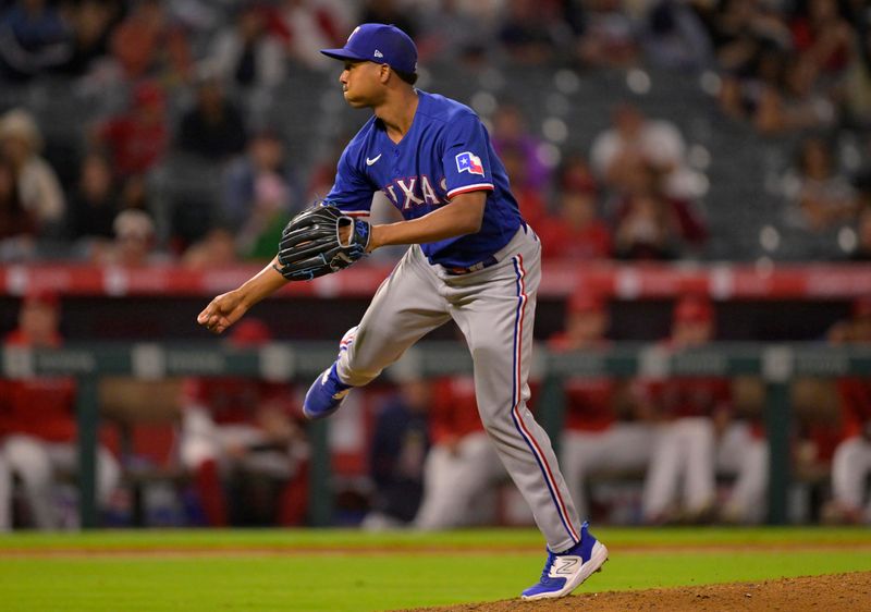 Sep 27, 2023; Anaheim, California, USA; Texas Rangers relief pitcher Jose Leclerc (25) throws a scoreless the ninth inning against the Los Angeles Angels at Angel Stadium. Mandatory Credit: Jayne Kamin-Oncea-USA TODAY Sports