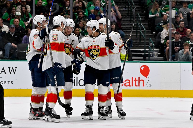 Mar 12, 2024; Dallas, Texas, USA; Florida Panthers left wing Matthew Tkachuk (19) and center Aleksander Barkov (16) and center Sam Reinhart (13) and defenseman Brandon Montour (62) and center Carter Verhaeghe (23) after Tkachuk scores the game winning goal against the Dallas Stars during the third period at the American Airlines Center. Mandatory Credit: Jerome Miron-USA TODAY Sports