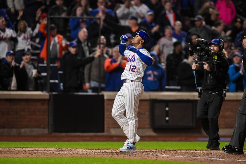 Apr 21, 2025; New York City, New York, USA; New York Mets shortstop Francisco Lindor (12) rounds the bases after hitting a three run home run against the Philadelphia Phillies during the seventh inning at Citi Field. Mandatory Credit: John Jones-Imagn Images