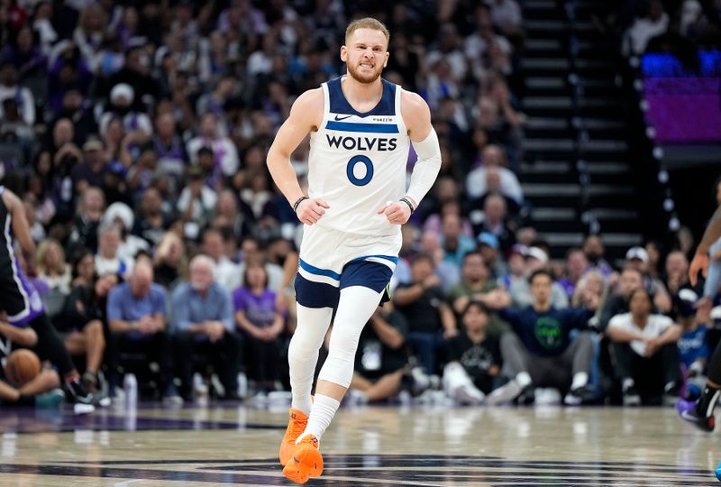 SACRAMENTO, CALIFORNIA - OCTOBER 24: Donte DiVincenzo #0 of the Minnesota Timberwolves reacts after making a three-pont shot against the Sacramento Kings in the fourth quarter at Golden 1 Center on October 24, 2024 in Sacramento, California. NOTE TO USER: User expressly acknowledges and agrees that, by downloading and or using this photograph, User is consenting to the terms and conditions of the Getty Images License Agreement. (Photo by Thearon W. Henderson/Getty Images)