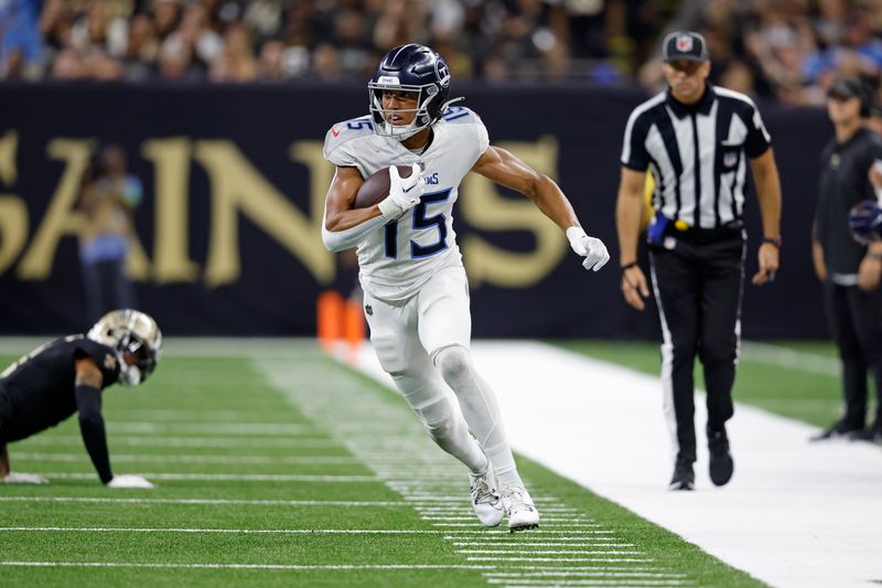 Tennessee Titans wide receiver Nick Westbrook-Ikhine (15) runs the ball during an NFL football game against the New Orleans Saints, Sunday, Sep. 10, 2023, in New Orleans. (AP Photo/Tyler Kaufman)