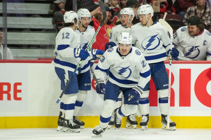 Nov 4, 2023; Ottawa, Ontario, CAN; Tampa Bay Lightning center Michael Eyssimont (23) scores in the second period against the Ottawa Senators at the Canadian Tire Centre. Mandatory Credit: Marc DesRosiers-USA TODAY Sports