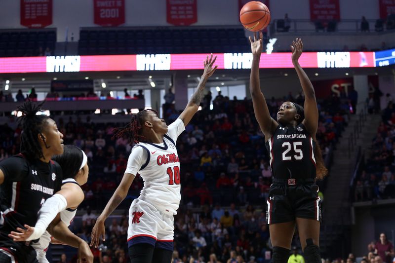 Feb 19, 2023; Oxford, Mississippi, USA; South Carolina Gamecocks guard Raven Johnson (25) shoots against Mississippi Rebels guard Destiny Salary (10) during the first half at The Sandy and John Black Pavilion at Ole Miss. Mandatory Credit: Petre Thomas-USA TODAY Sports