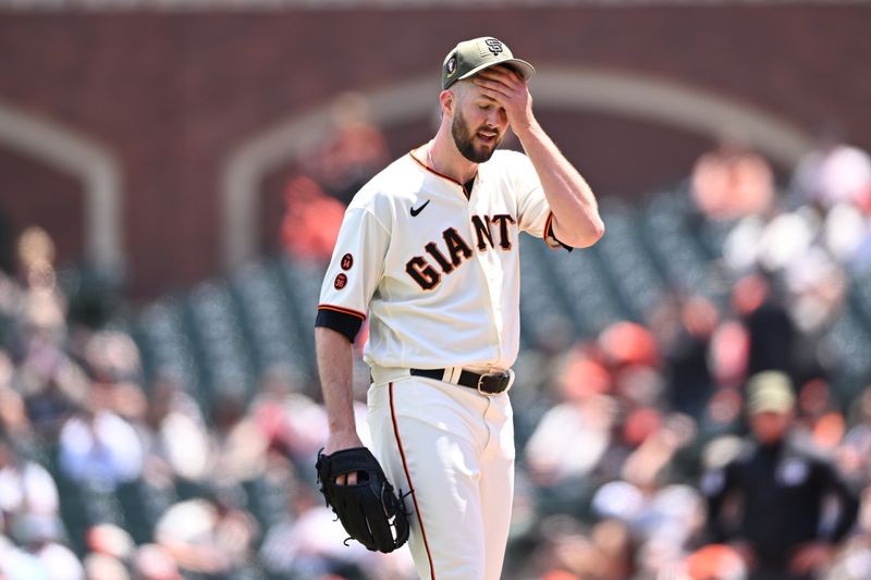 May 21, 2023; San Francisco, California, USA; San Francisco Giants starting pitcher Alex Wood (57) reacts after being called for a balk against the Miami Marlins during the third inning at Oracle Park. Mandatory Credit: Robert Edwards-USA TODAY Sports