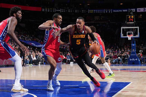 PHILADELPHIA, PA - DECEMBER 8: Dejounte Murray #5 of the Atlanta Hawks drives to the basket during the game against the Philadelphia 76ers on December 8, 2023 at the Wells Fargo Center in Philadelphia, Pennsylvania NOTE TO USER: User expressly acknowledges and agrees that, by downloading and/or using this Photograph, user is consenting to the terms and conditions of the Getty Images License Agreement. Mandatory Copyright Notice: Copyright 2023 NBAE (Photo by Jesse D. Garrabrant/NBAE via Getty Images)