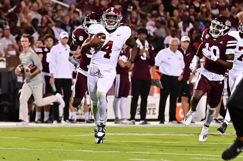 Sep 30, 2023; Starkville, Mississippi, USA; Alabama Crimson Tide quarterback Jalen Milroe (4) runs the ball against the Mississippi State Bulldogs on a play that would result in a touchdown during the first quarter at Davis Wade Stadium at Scott Field. Mandatory Credit: Matt Bush-USA TODAY Sports