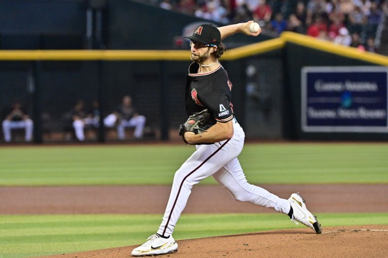 Jul 26, 2023; Phoenix, Arizona, USA;  Arizona Diamondbacks starting pitcher Zac Gallen (23) throws in the first inning against the St. Louis Cardinals at Chase Field. Mandatory Credit: Matt Kartozian-USA TODAY Sports