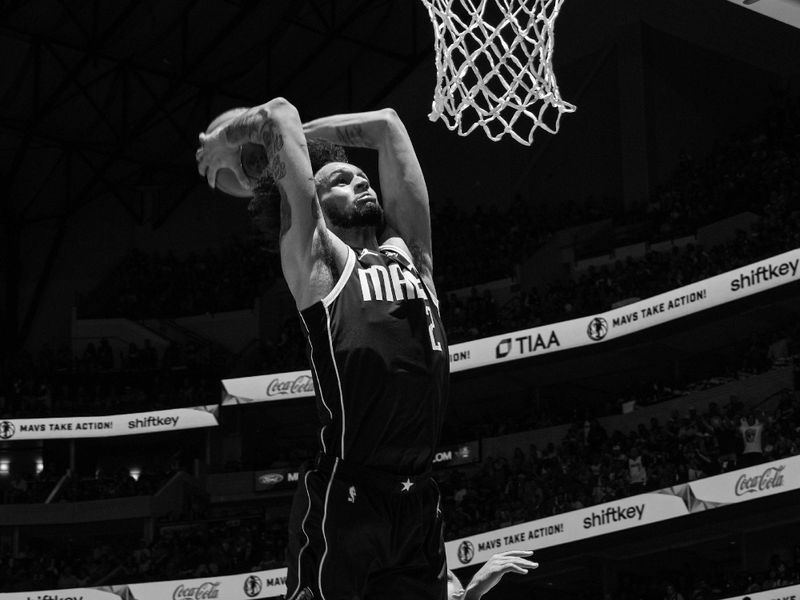 DALLAS, TX - JUNE 14: (EDITORS NOTE: this photo has been converted to black and white)Dereck Lively II #2 of the Dallas Mavericks dunks the ball during the game against the Boston Celtics during Game 4 of the 2024 NBA Finals on June 14, 2024 at the American Airlines Center in Dallas, Texas. NOTE TO USER: User expressly acknowledges and agrees that, by downloading and or using this photograph, User is consenting to the terms and conditions of the Getty Images License Agreement. Mandatory Copyright Notice: Copyright 2024 NBAE (Photo by Jesse D. Garrabrant/NBAE via Getty Images)