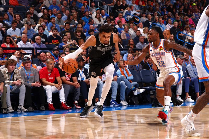 OKLAHOMA CITY, OK - OCTOBER 30: Victor Wembanyama #1 of the San Antonio Spurs handles the ball during the game against the Oklahoma City Thunder on October 30, 2024 at Paycom Arena in Oklahoma City, Oklahoma. NOTE TO USER: User expressly acknowledges and agrees that, by downloading and or using this photograph, User is consenting to the terms and conditions of the Getty Images License Agreement. Mandatory Copyright Notice: Copyright 2024 NBAE (Photo by Zach Beeker/NBAE via Getty Images)