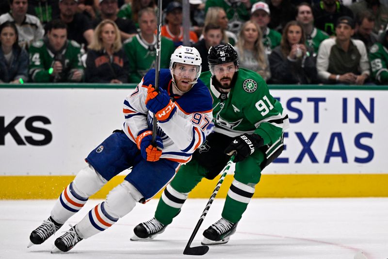 May 29, 2025; Dallas, Texas, USA; Edmonton Oilers center Connor McDavid (97) skates ahead of Dallas Stars center Tyler Seguin (91) during the second period in game five of the Western Conference Final of the 2025 Stanley Cup Playoffs at American Airlines Center. Mandatory Credit: Jerome Miron-Imagn Images