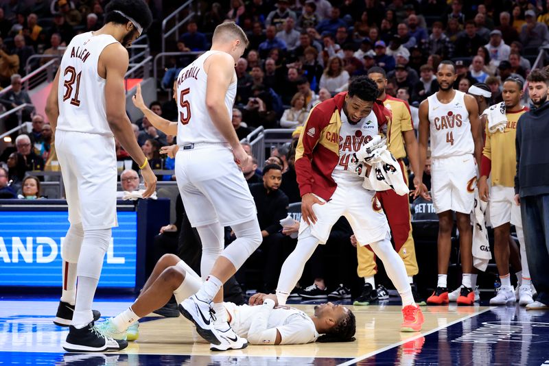 INDIANAPOLIS, INDIANA - JANUARY 14: Donovan Mitchell #45 of the Cleveland Cavaliers reacts after Darius Garland #10 is fouled during the second half against the Indiana Pacers at Gainbridge Fieldhouse on January 14, 2025 in Indianapolis, Indiana. NOTE TO USER: User expressly acknowledges and agrees that, by downloading and or using this photograph, User is consenting to the terms and conditions of the Getty Images License Agreement. (Photo by Justin Casterline/Getty Images)