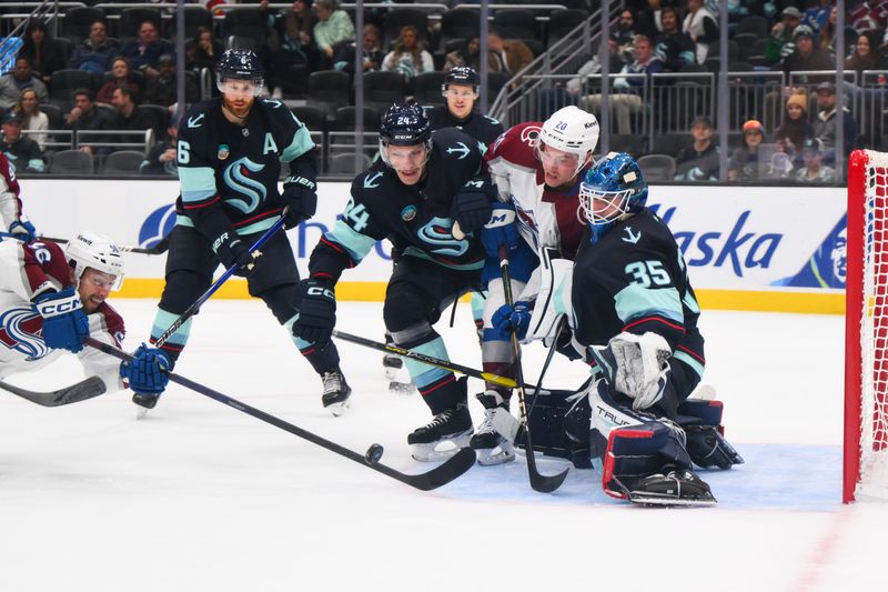 Nov 13, 2023; Seattle, Washington, USA; Seattle Kraken goaltender Joey Daccord (35) defends the goal against the Colorado Avalanche during the third period at Climate Pledge Arena. Mandatory Credit: Steven Bisig-USA TODAY Sports