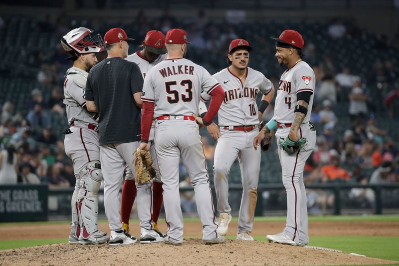 Jun 9, 2023; Detroit, Michigan, USA; The Arizona Diamondbacks huddle on the mound during the game against the Detroit Tigers at Comerica Park. Mandatory Credit: Brian Bradshaw Sevald-USA TODAY Sports