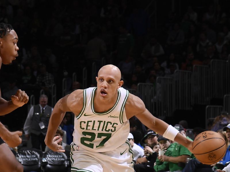 BOSTON, MA - OCTOBER 13: Jordan Walsh #27 of the Boston Celtics dribbles the ball during the game =against the Toronto Raptors during a NBA pre season game on October 13, 2024 at TD Garden in Boston, Massachusetts. NOTE TO USER: User expressly acknowledges and agrees that, by downloading and/or using this Photograph, user is consenting to the terms and conditions of the Getty Images License Agreement. Mandatory Copyright Notice: Copyright 2024 NBAE (Photo by Brian Babineau/NBAE via Getty Images)