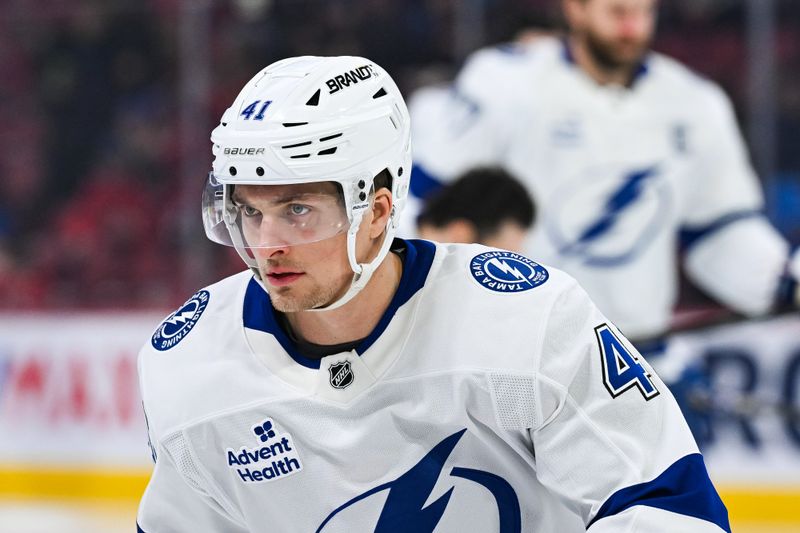 Jan 21, 2025; Montreal, Quebec, CAN; Tampa Bay Lightning right wing Mitchell Chaffee (41) looks on during warm-up before the game against the Montreal Canadiens at Bell Centre. Mandatory Credit: David Kirouac-Imagn Images